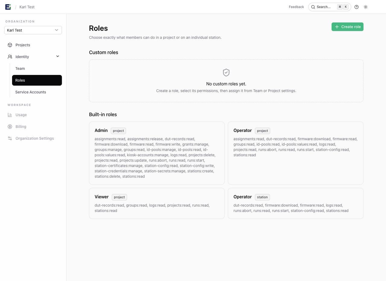 Roles page showing built-in project Admin, Operator, and Viewer roles and the station Operator role